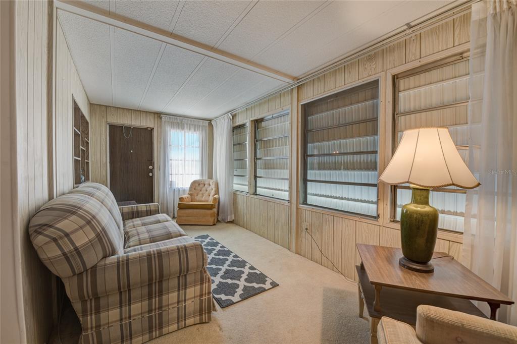 5619 Bayshore Road, Unit 312 Palmetto, FL 34221 - Photo 8 of 40 a living room with furniture