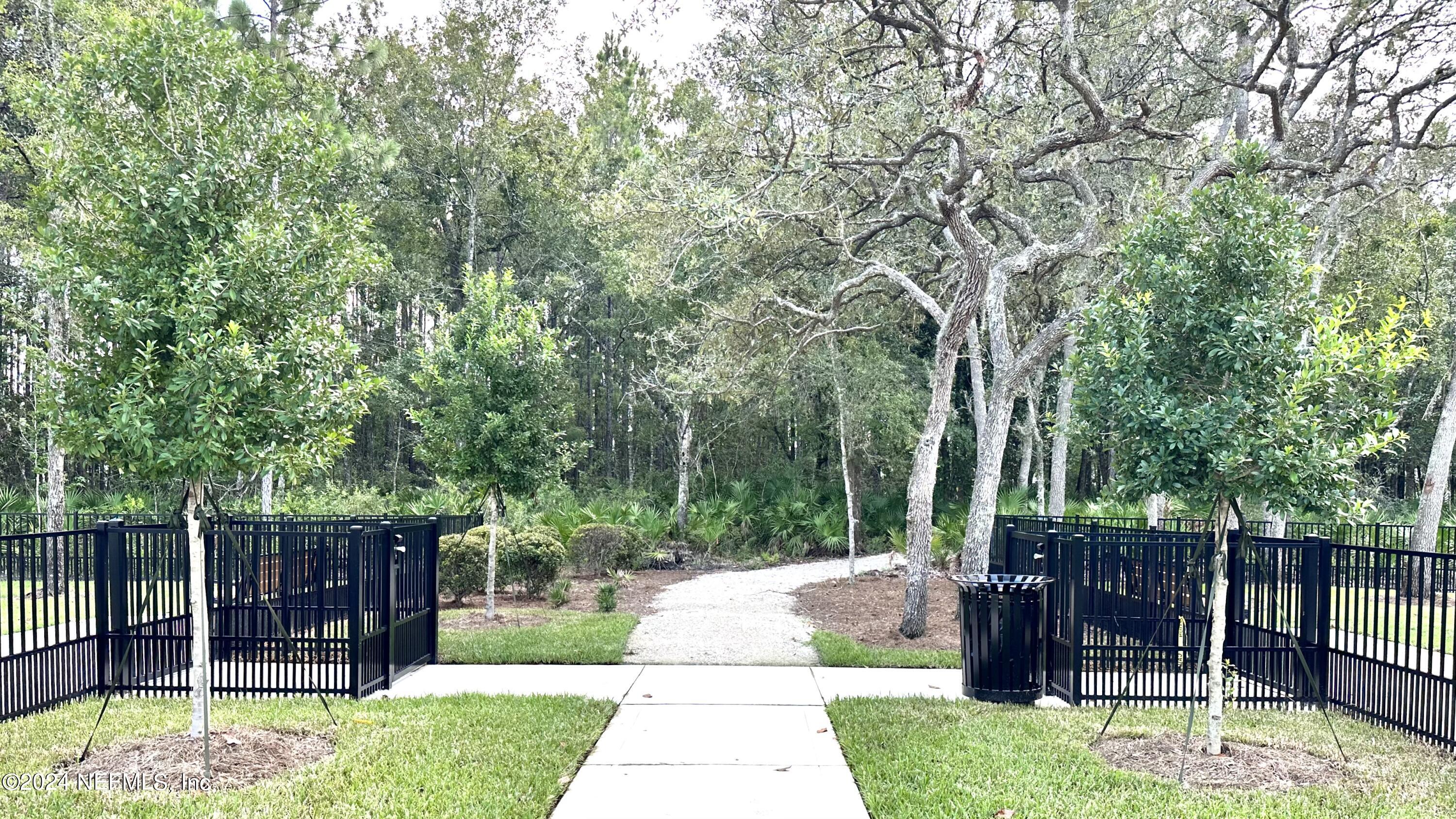 170 Ridgehill Way St. Johns, FL 32259 - Photo 48 of 57 a view of a dinning table and chairs in the back yard