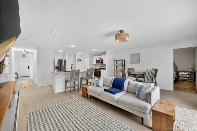 a living room with furniture and a couch