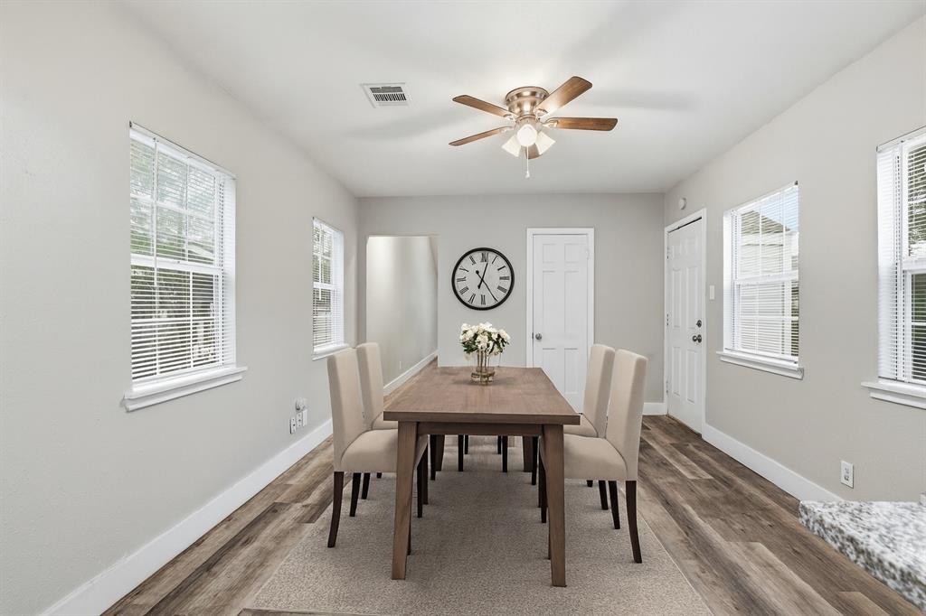 227 South Hampton Road Dallas, TX 75208 - Photo 19 of 32 Dining space with healthy amount of natural light, wood finished floors, and ceiling fan