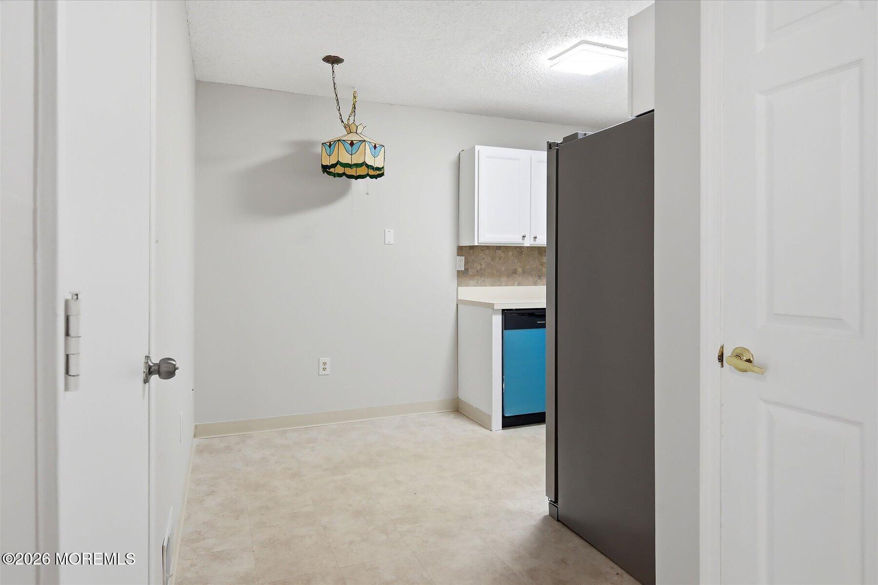 7 Riva Boulevard Brick, NJ 08723 - Photo 9 of 31 09-Dining Room to Kitchen