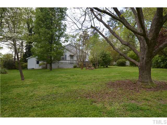 7000 Leesville Road Raleigh, NC 27613 - Photo 11 of 24 a view of yard with green space and trees