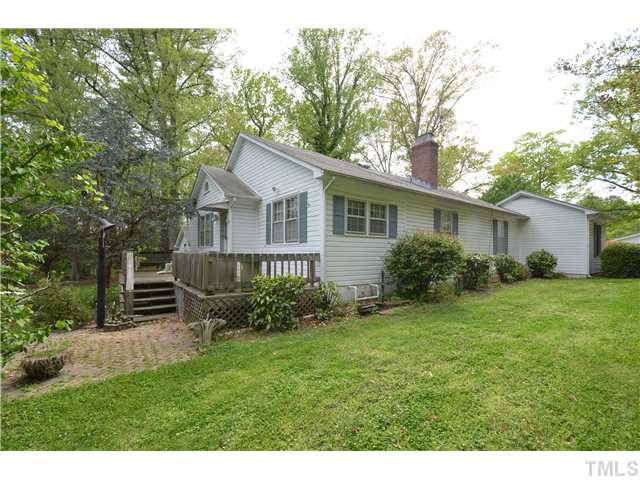7000 Leesville Road Raleigh, NC 27613 - Photo 14 of 24 a house view with a garden space