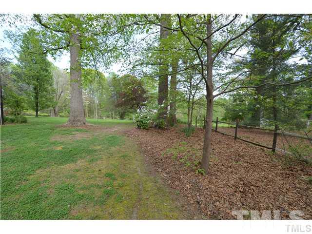 7000 Leesville Road Raleigh, NC 27613 - Photo 4 of 24 a view of outdoor space with trees all around