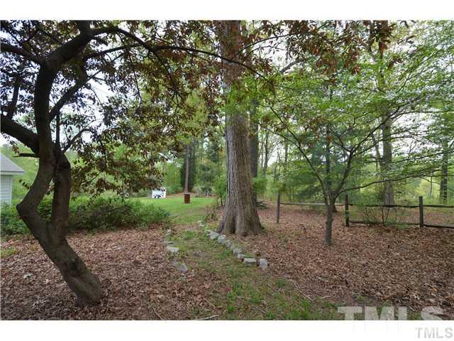 7000 Leesville Road Raleigh, NC 27613 - Photo 6 of 24 a view of a large yard with lots of green space