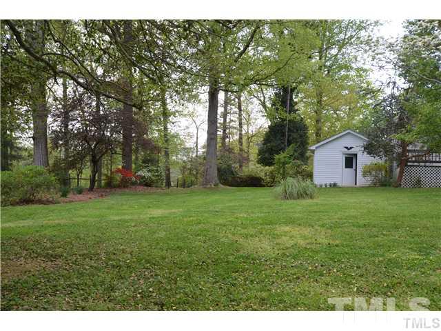 7000 Leesville Road Raleigh, NC 27613 - Photo 10 of 24 a view of a backyard with large trees