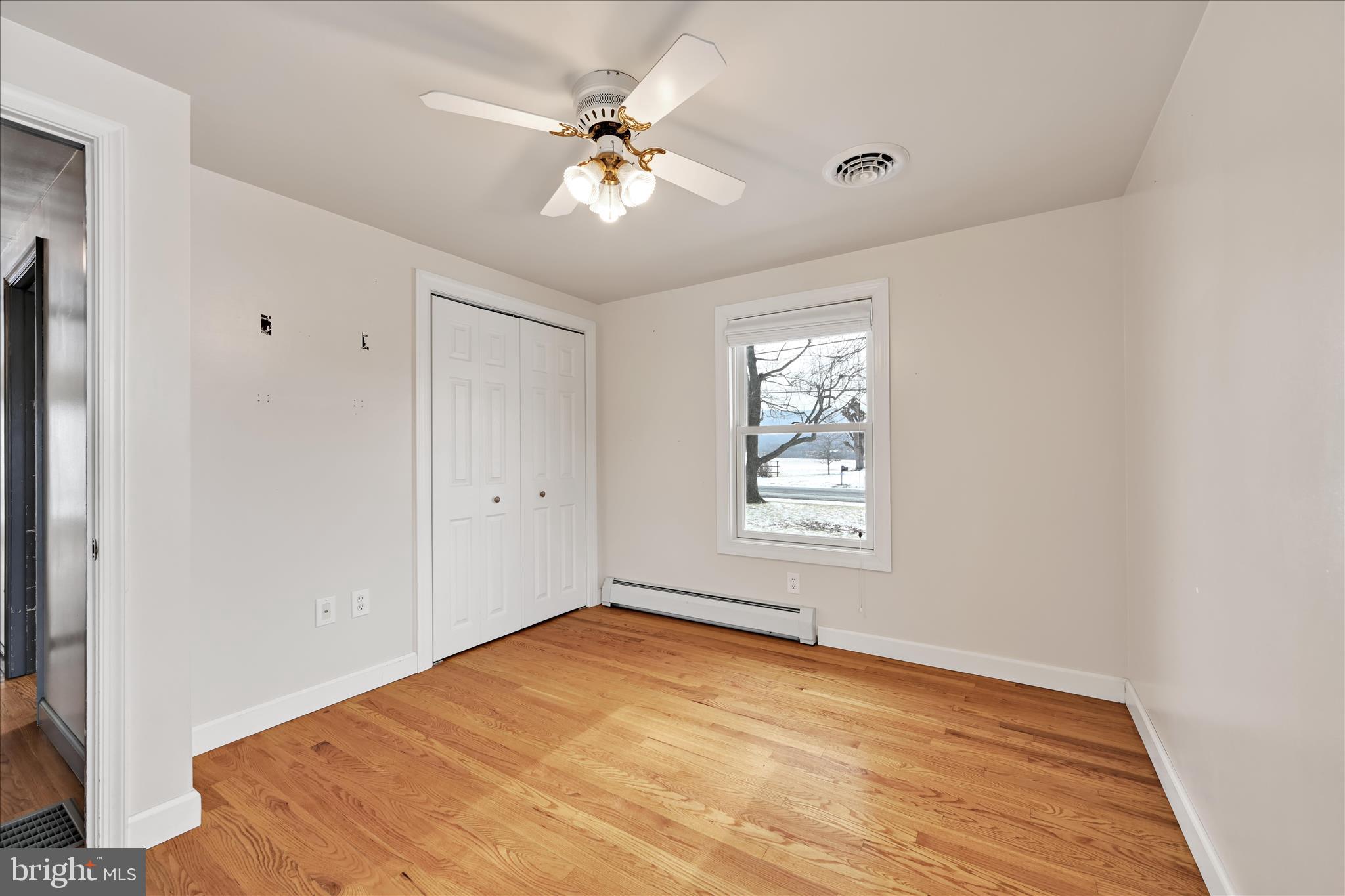 424 Fearnot Road Sacramento, PA 17968 - Photo 17 of 44 a view of an empty room with a window