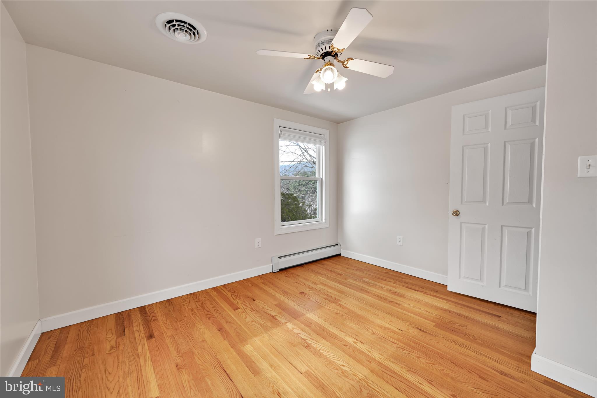 424 Fearnot Road Sacramento, PA 17968 - Photo 18 of 44 a view of an empty room with windows