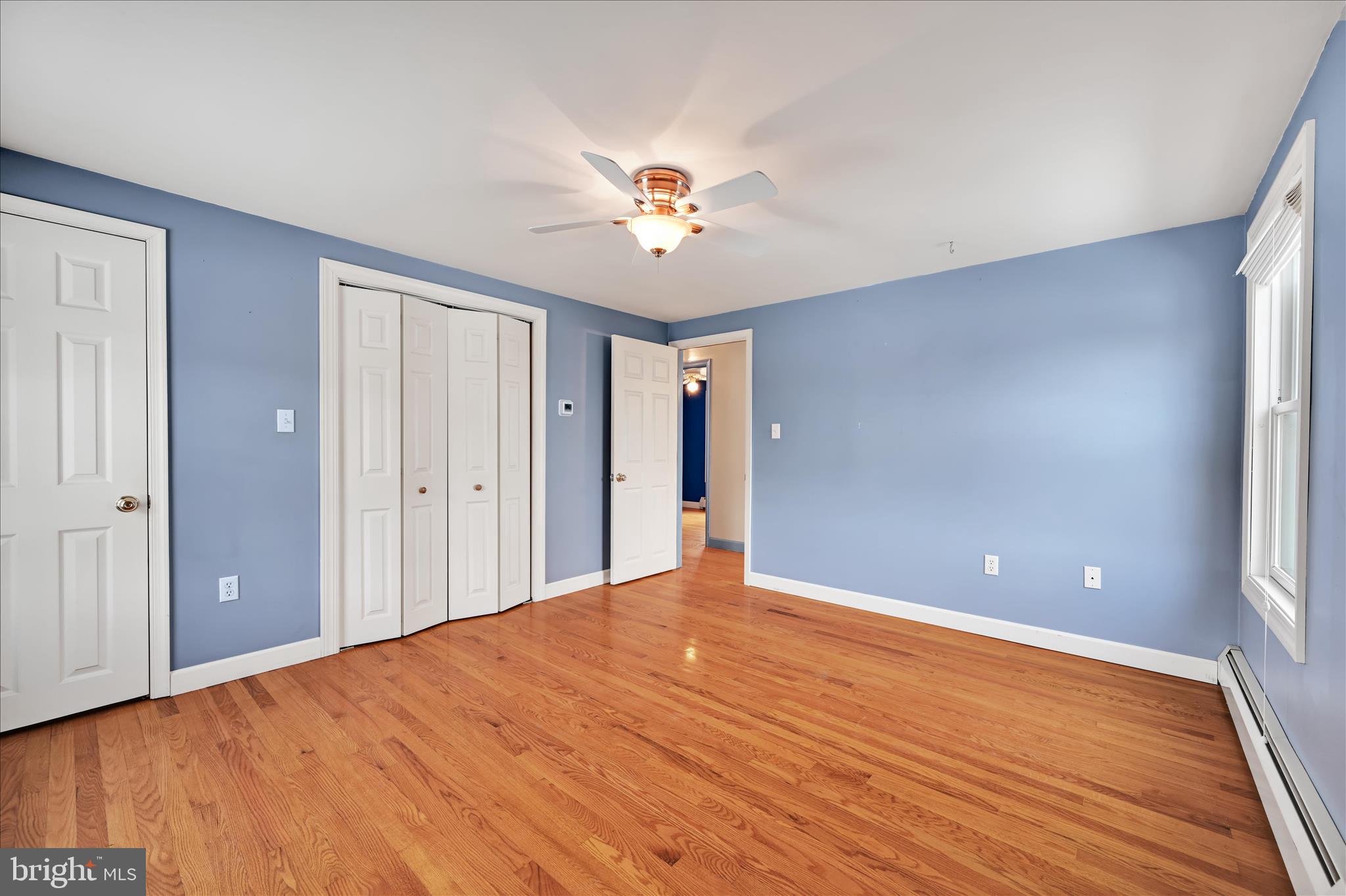 424 Fearnot Road Sacramento, PA 17968 - Photo 20 of 44 a view of a livingroom with a window and a ceiling fan
