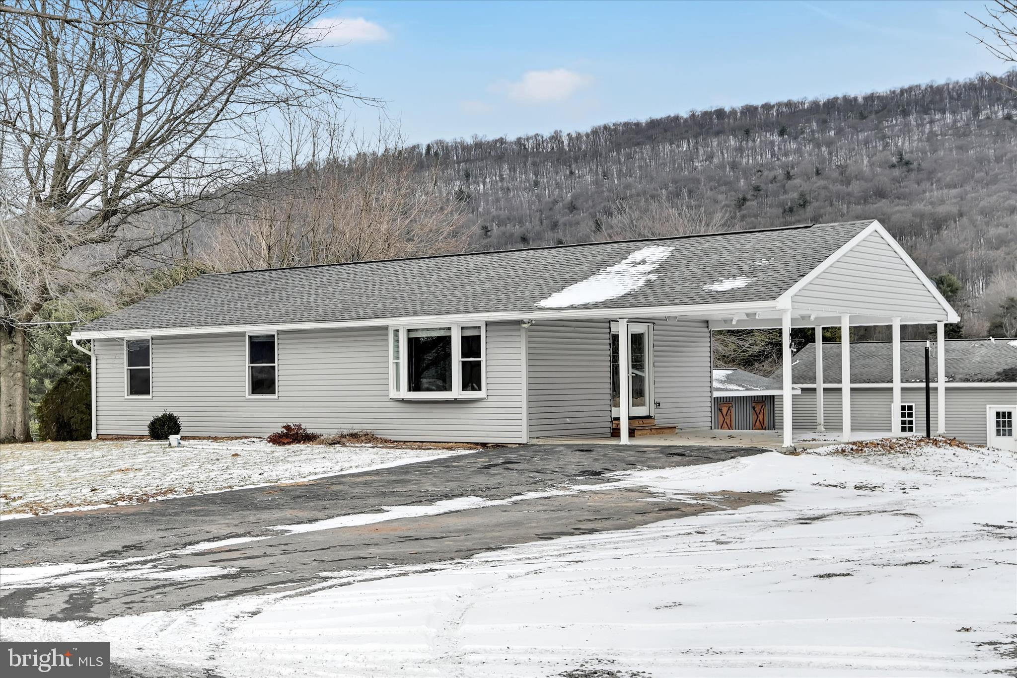 424 Fearnot Road Sacramento, PA 17968 - Photo 2 of 44 a house with trees in the background