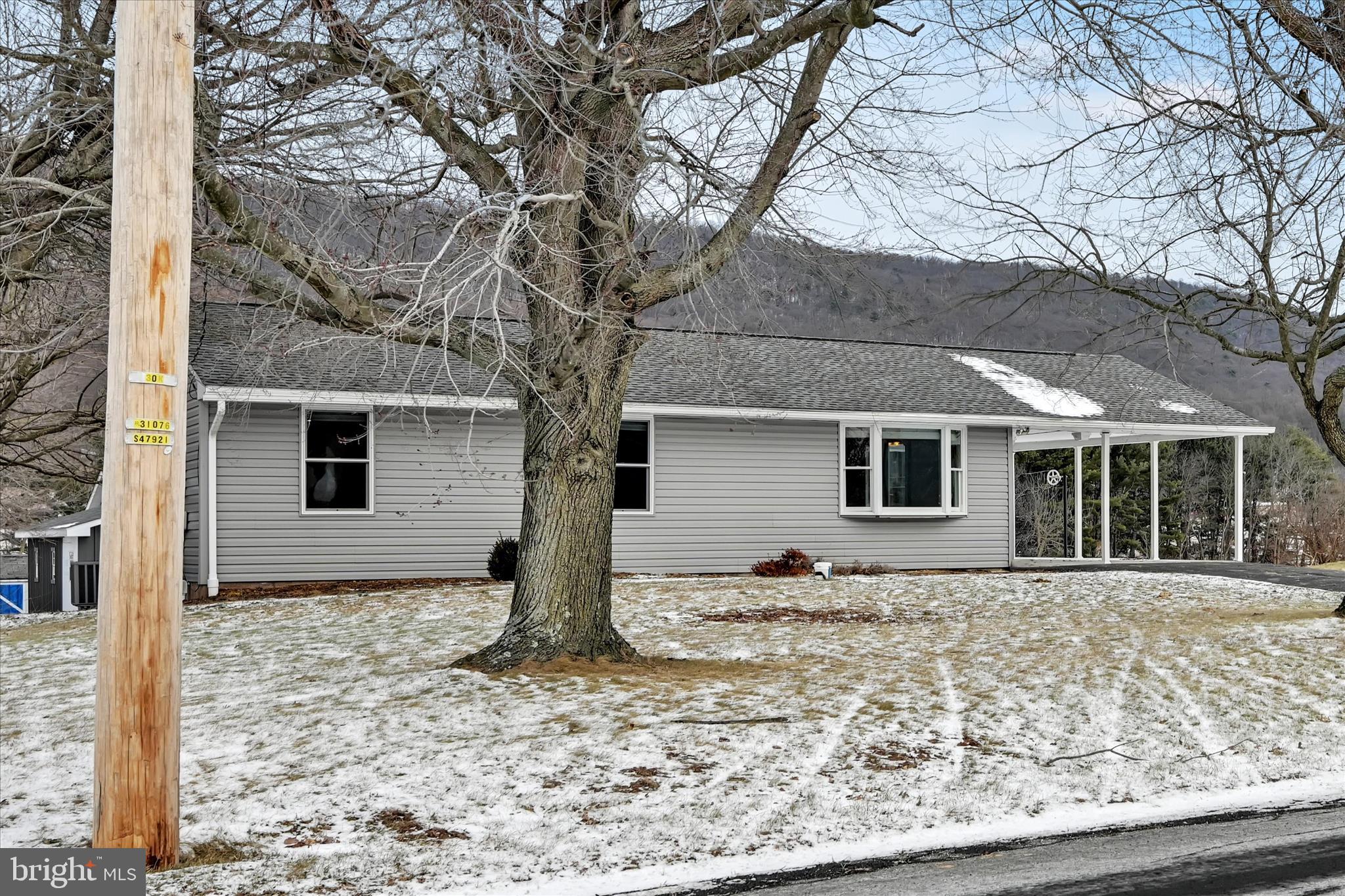 424 Fearnot Road Sacramento, PA 17968 - Photo 3 of 44 a front view of a house with a yard