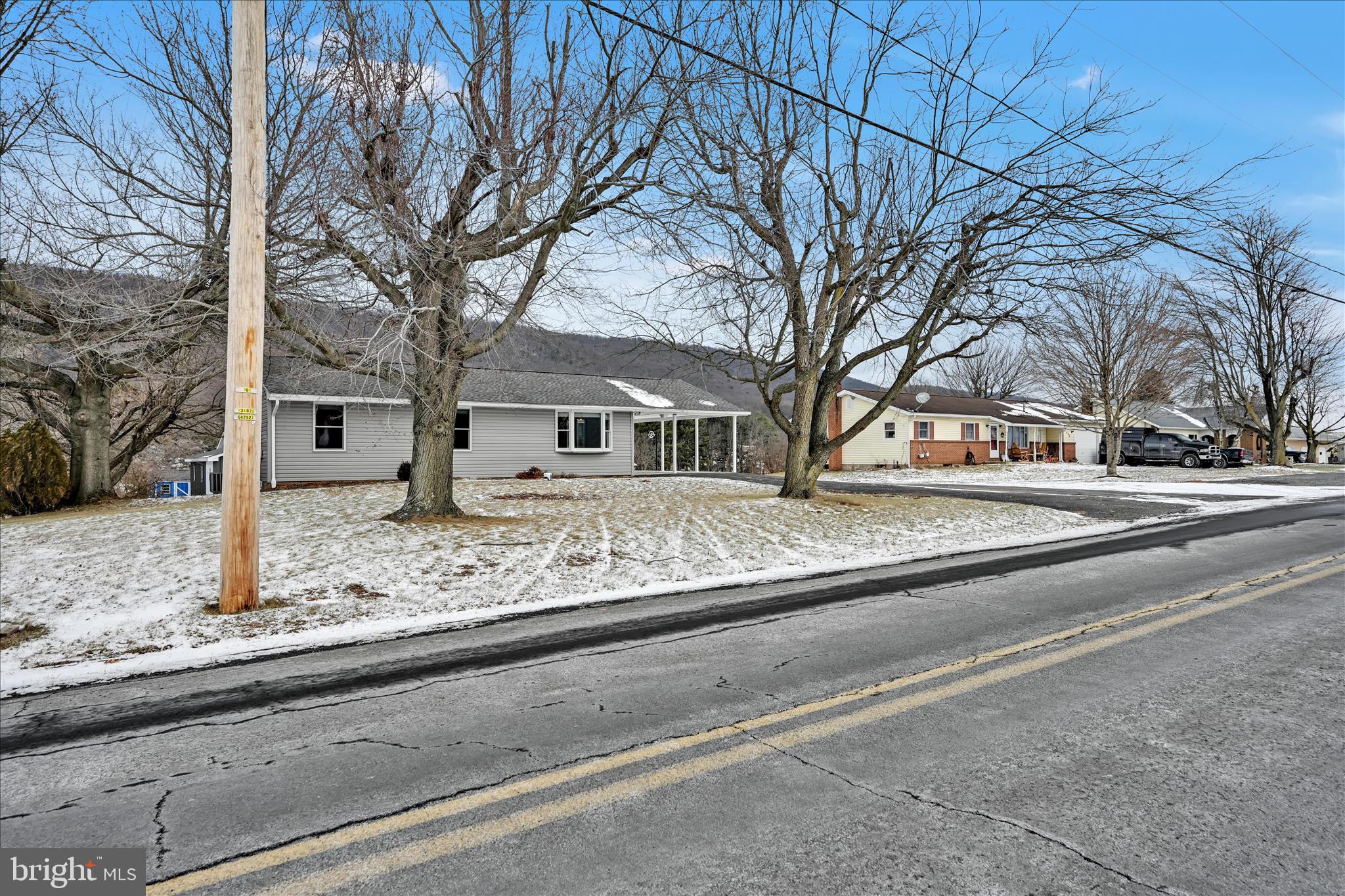424 Fearnot Road Sacramento, PA 17968 - Photo 5 of 44 a house with trees in front of it