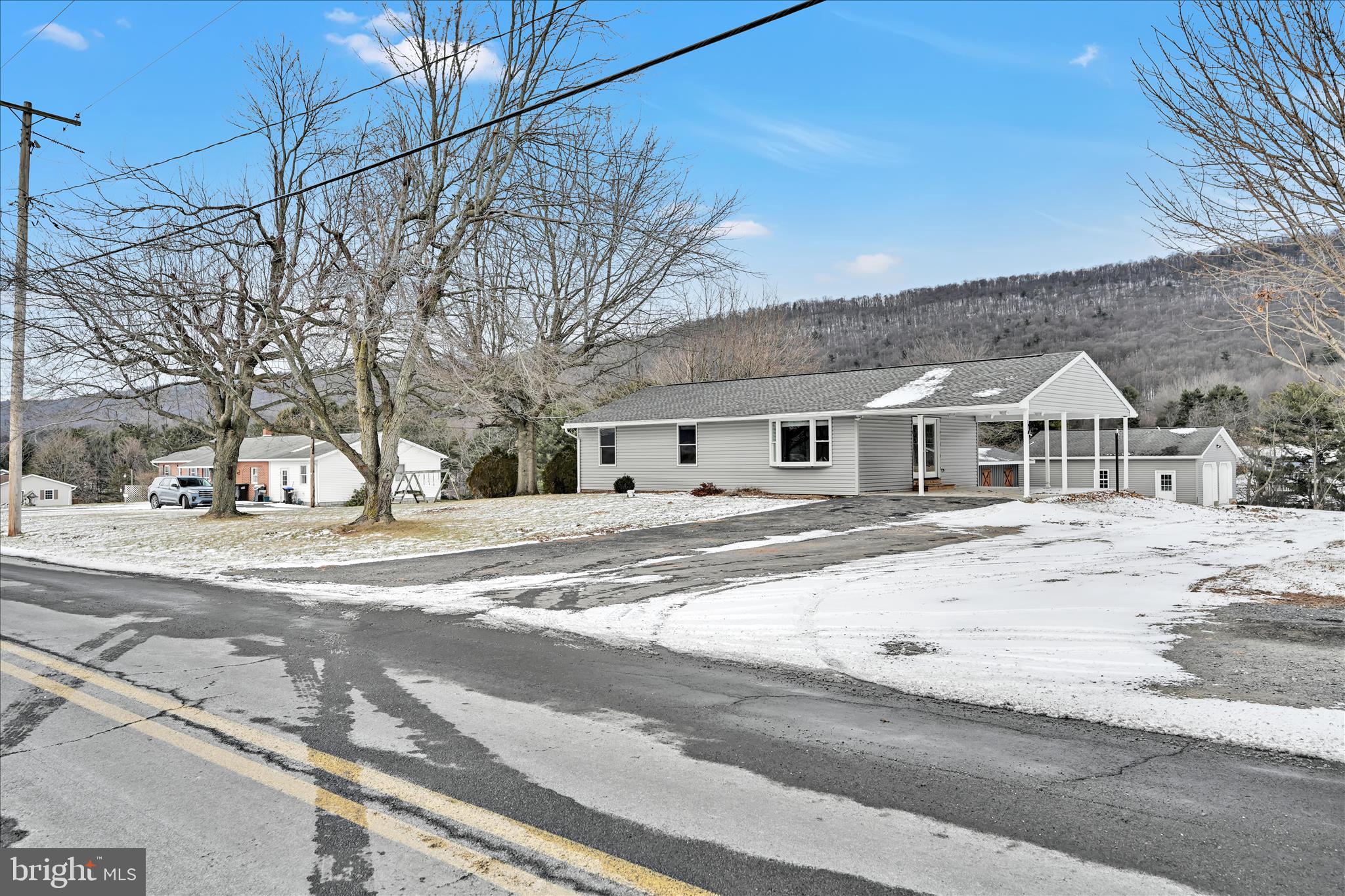 424 Fearnot Road Sacramento, PA 17968 - Photo 6 of 44 a view of white house with a road