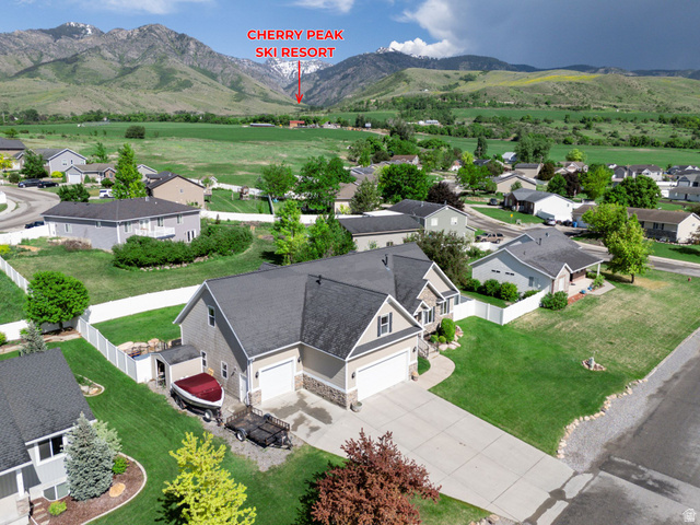 580 Cherry Ridge Lane Richmond, UT 84333 - Photo 52 of 53 Aerial perspective of suburban area with mountains