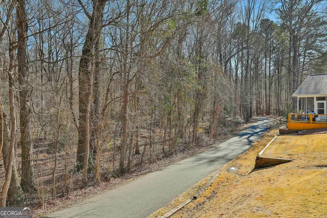 view of yard with wooden fence