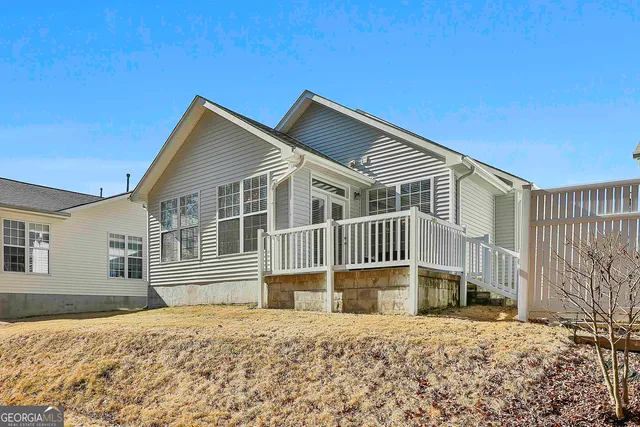 a view of a street with houses on both side