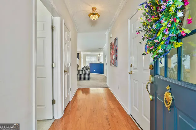 a view of a hallway with flowers