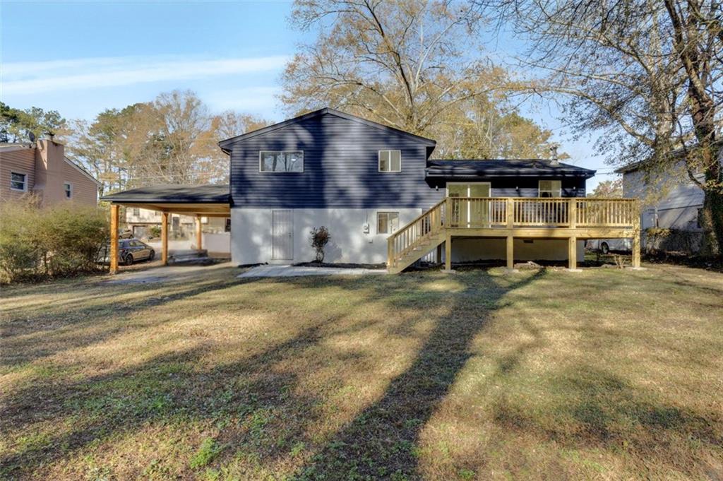 6695 Cedar Hurst Trail Atlanta, GA 30349 - Photo 23 of 24 a car parked in front of a house