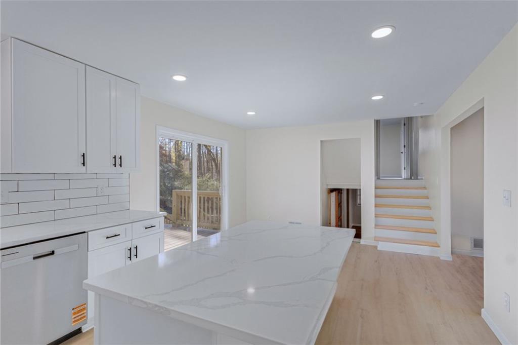 6695 Cedar Hurst Trail Atlanta, GA 30349 - Photo 9 of 24 a very nice looking room with a large window