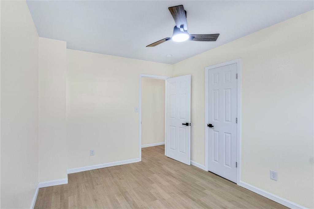 6695 Cedar Hurst Trail Atlanta, GA 30349 - Photo 10 of 24 a view of an empty room