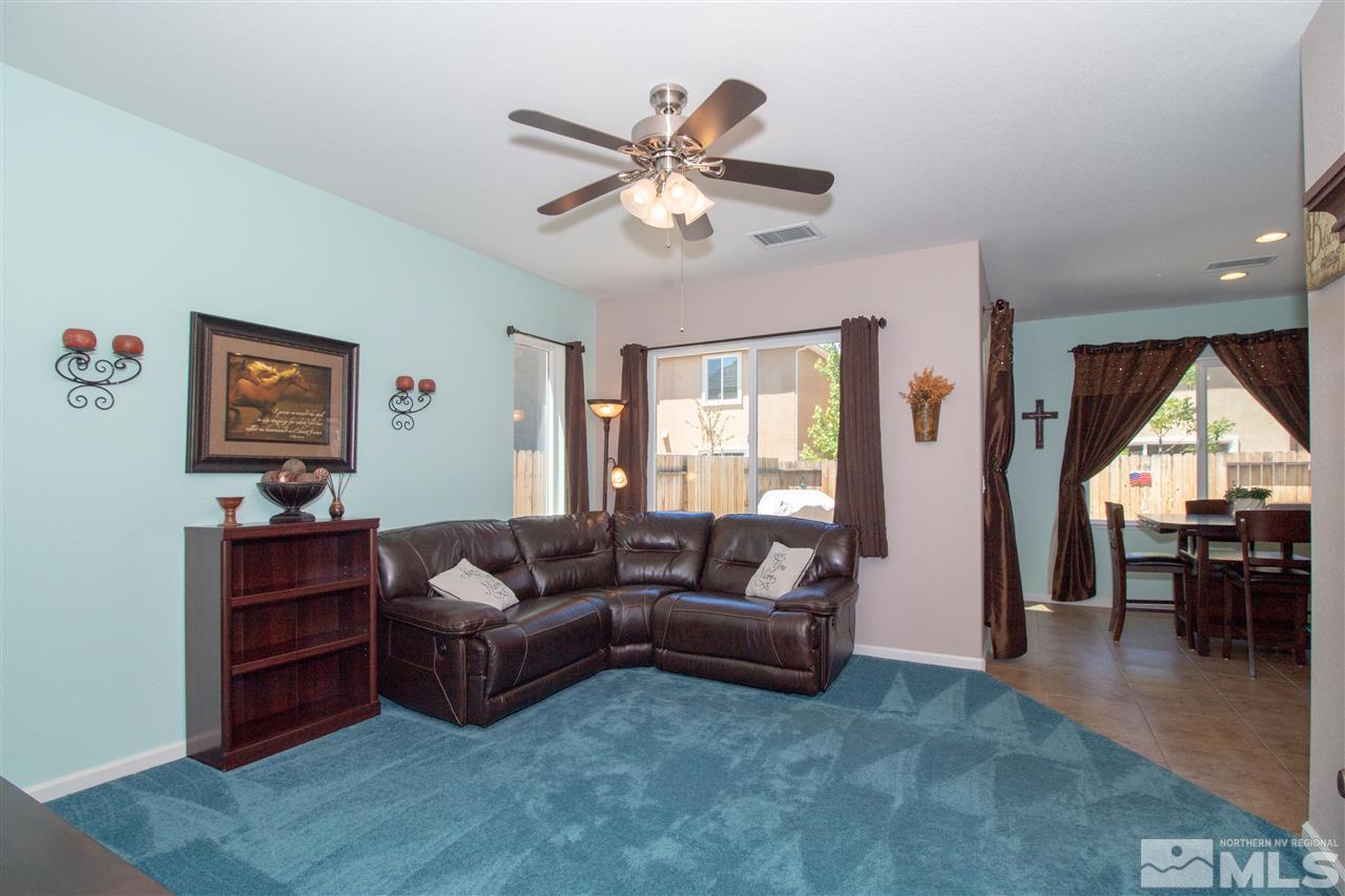 1945 Hope Valley Drive Reno, NV 89521 - Photo 2 of 22 a living room with furniture and a large window