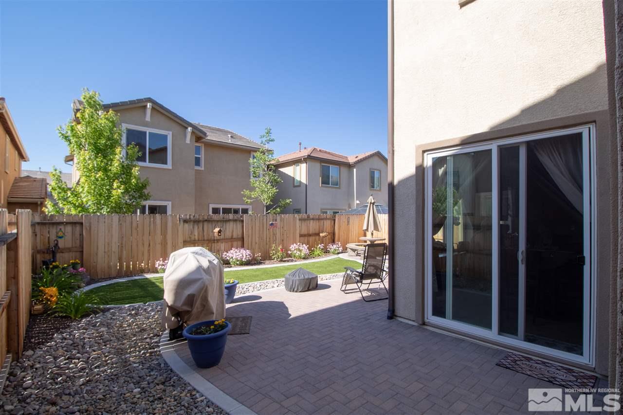 1945 Hope Valley Drive Reno, NV 89521 - Photo 21 of 22 a view of a house with backyard and sitting area