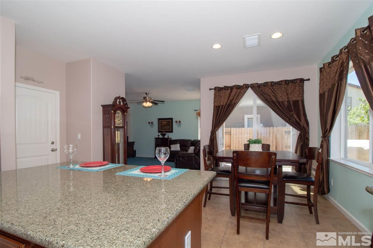 1945 Hope Valley Drive Reno, NV 89521 - Photo 6 of 22 a view of a dining room with furniture and a window