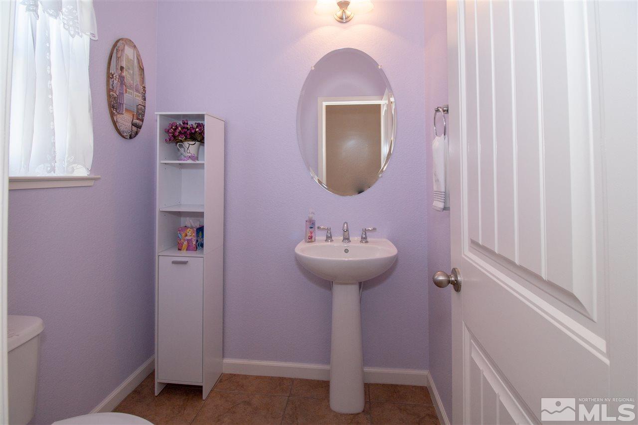 1945 Hope Valley Drive Reno, NV 89521 - Photo 8 of 22 a bathroom with a sink and mirror