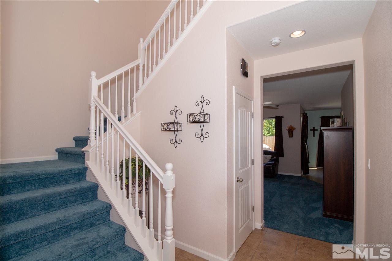1945 Hope Valley Drive Reno, NV 89521 - Photo 9 of 22 a view of a hallway with wooden floor and entryway