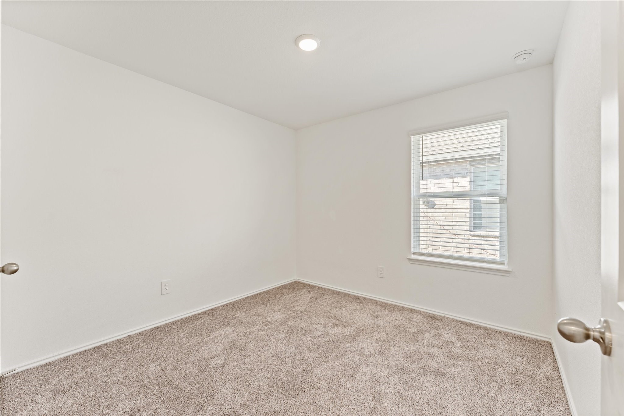 24210 Sandstone Valley Lane Spring, TX 77373 - Photo 15 of 33 an empty room with a window