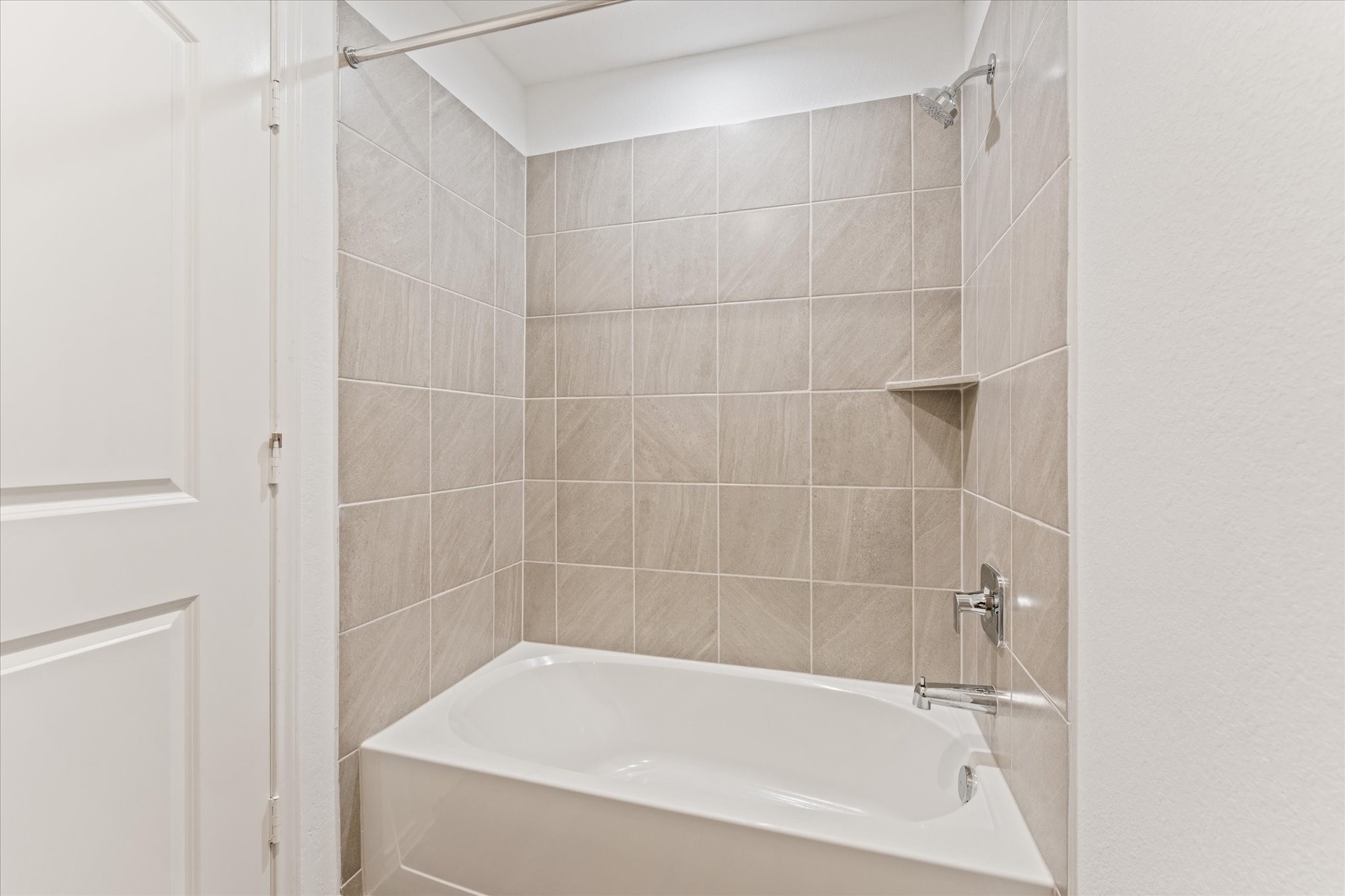 24210 Sandstone Valley Lane Spring, TX 77373 - Photo 24 of 33 a bathroom with a bathtub