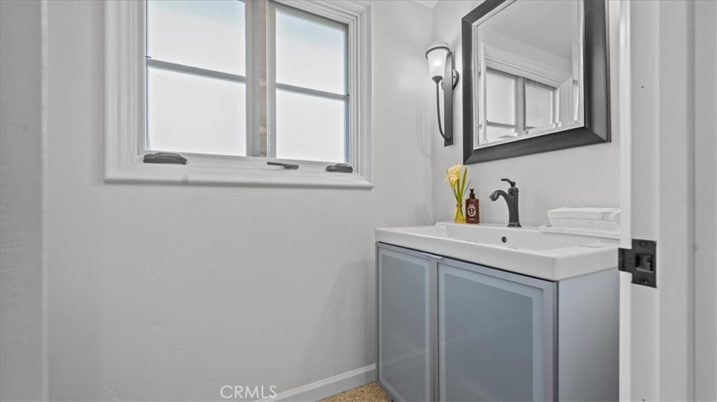 460 University Circle Claremont, CA 91711 - Photo 16 of 41 a bathroom with a sink and a vanity