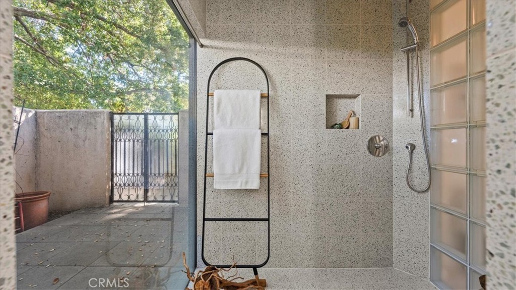 460 University Circle Claremont, CA 91711 - Photo 23 of 41 a bathroom with a glass shower door