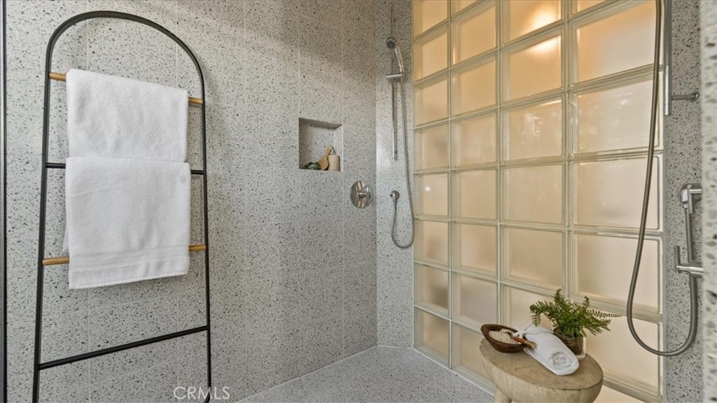 460 University Circle Claremont, CA 91711 - Photo 24 of 41 a room with a glass door shower and a mirror