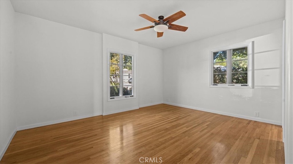 460 University Circle Claremont, CA 91711 - Photo 25 of 41 a view of an empty room with a window and wooden floor