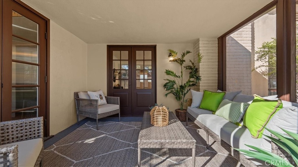 460 University Circle Claremont, CA 91711 - Photo 29 of 41 a living room with furniture and a window