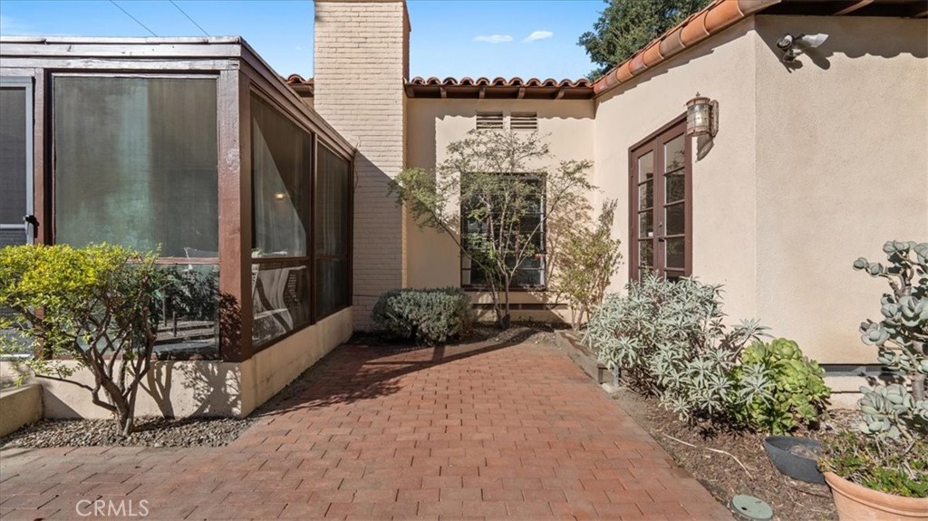 460 University Circle Claremont, CA 91711 - Photo 30 of 41 a couple of potted plants in front of door