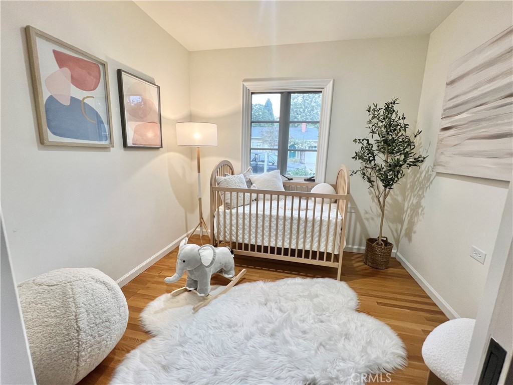 460 University Circle Claremont, CA 91711 - Photo 9 of 41 a bedroom with a bed and a window