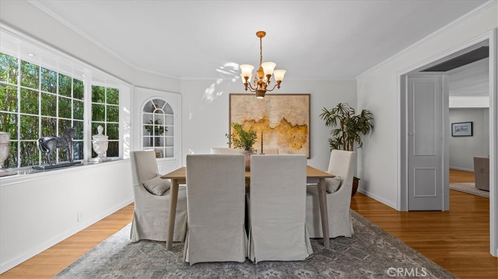 460 University Circle Claremont, CA 91711 - Photo 10 of 41 a living room with furniture and a chandelier