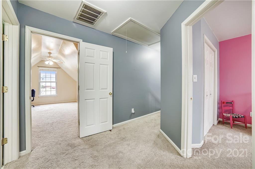 3795 Kennedy Road Gastonia, NC 28056 - Photo 18 of 32 an empty room with windows and closet