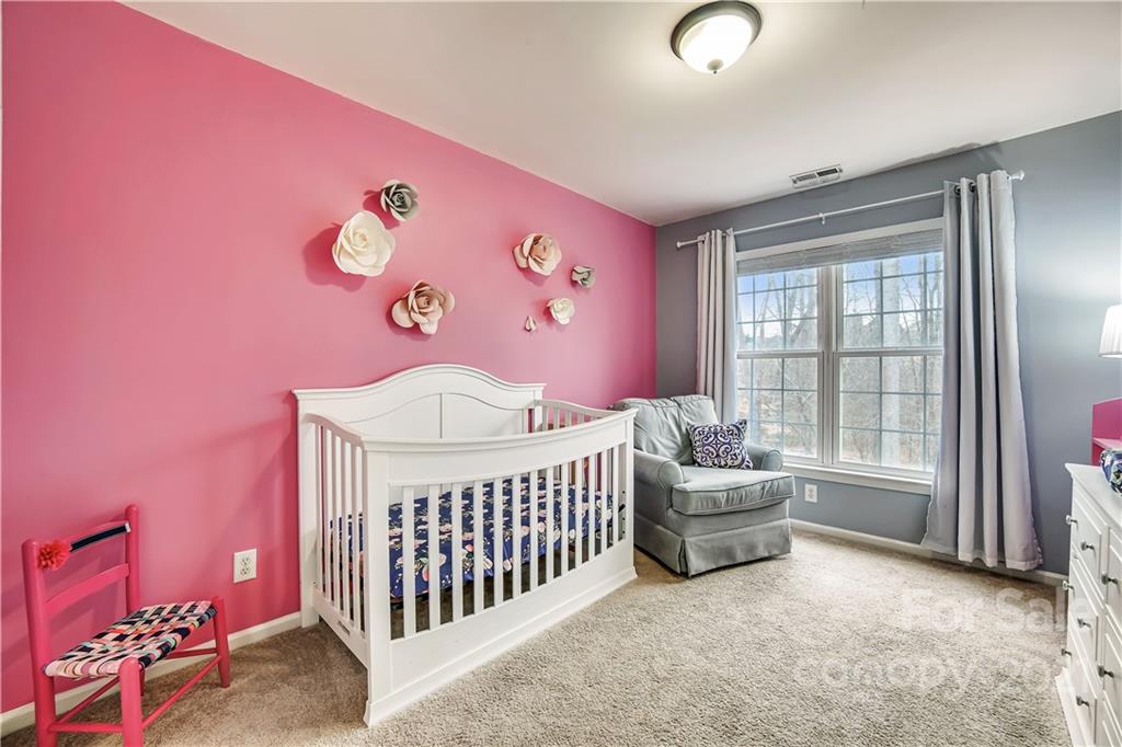 3795 Kennedy Road Gastonia, NC 28056 - Photo 22 of 32 a bedroom with a bed and a window