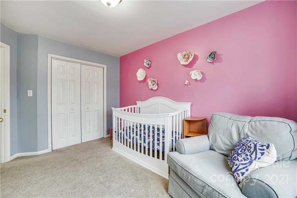 3795 Kennedy Road Gastonia, NC 28056 - Photo 23 of 32 a bedroom with furniture and a bed