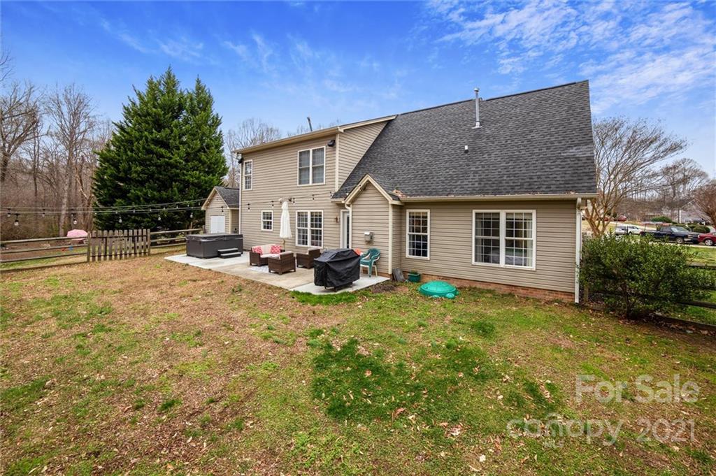 3795 Kennedy Road Gastonia, NC 28056 - Photo 30 of 32 a view of a house with backyard and sitting area