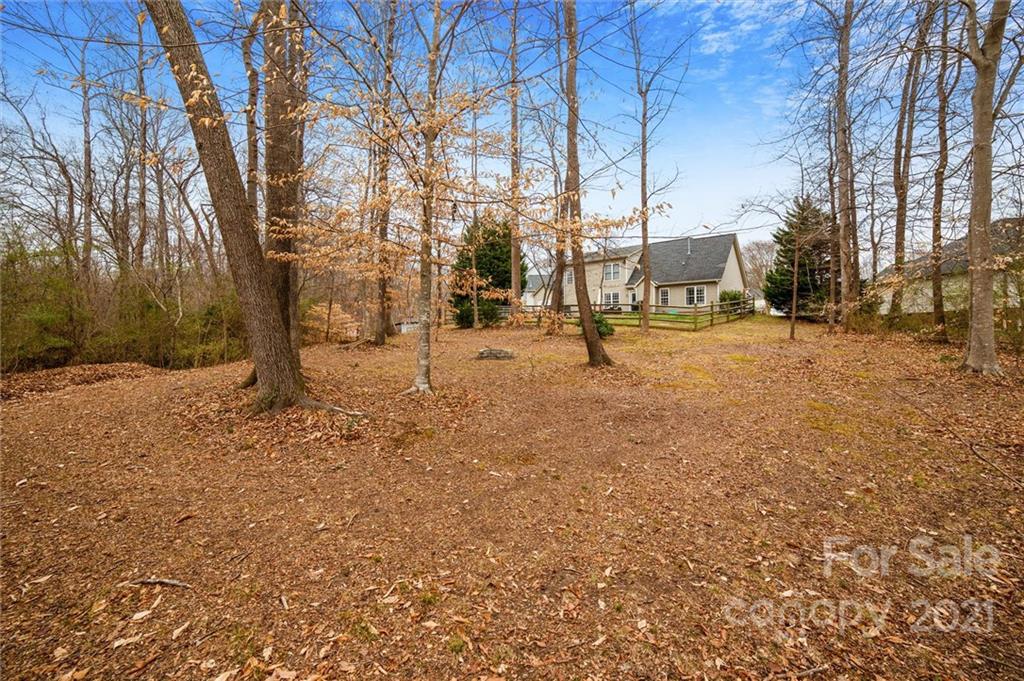 3795 Kennedy Road Gastonia, NC 28056 - Photo 31 of 32 a view of a yard with a tree