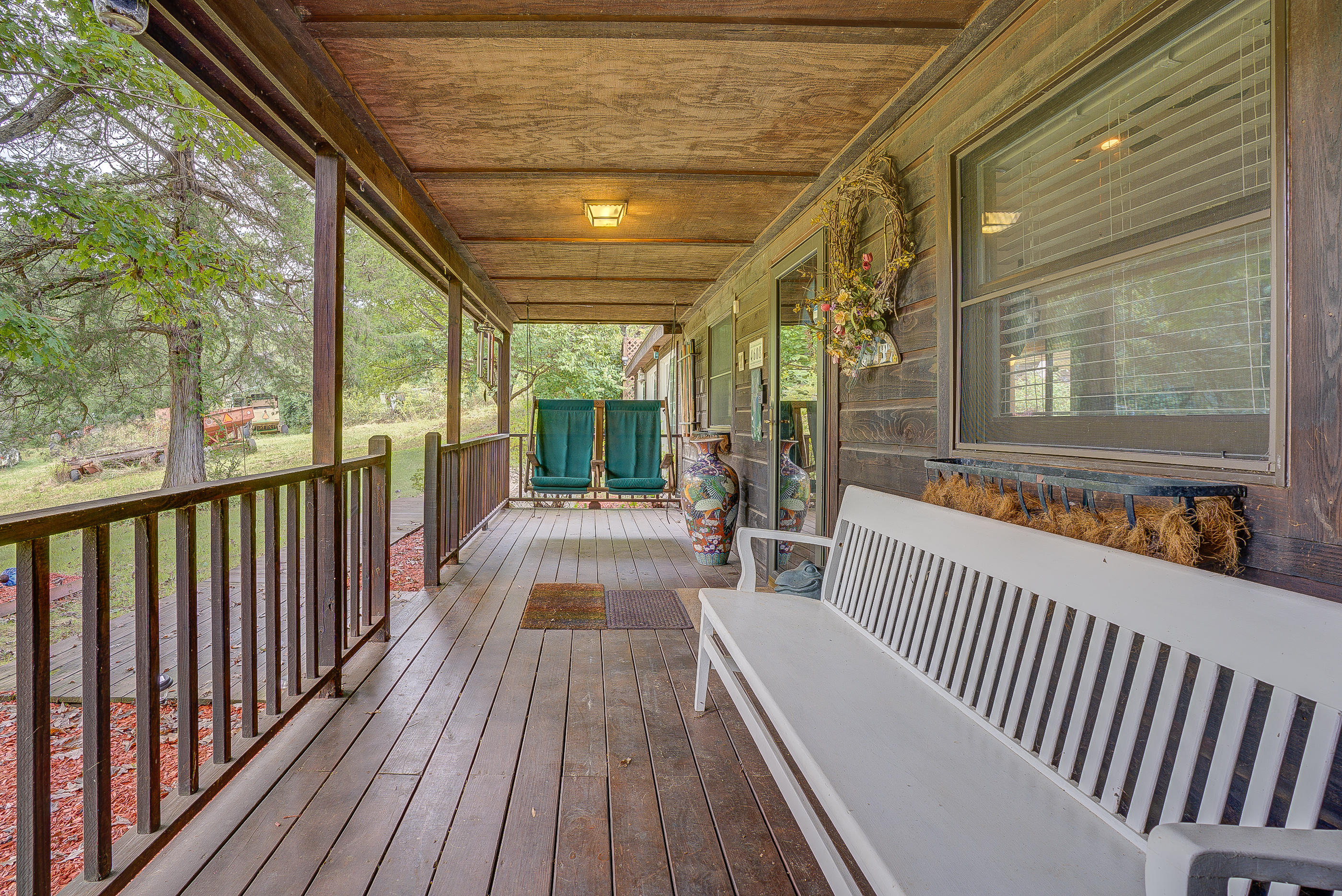 4608 Ferguson Valley Road Roanoke, VA 24014 - Photo 22 of 36 a view of a porch with wooden floor and outdoor seating