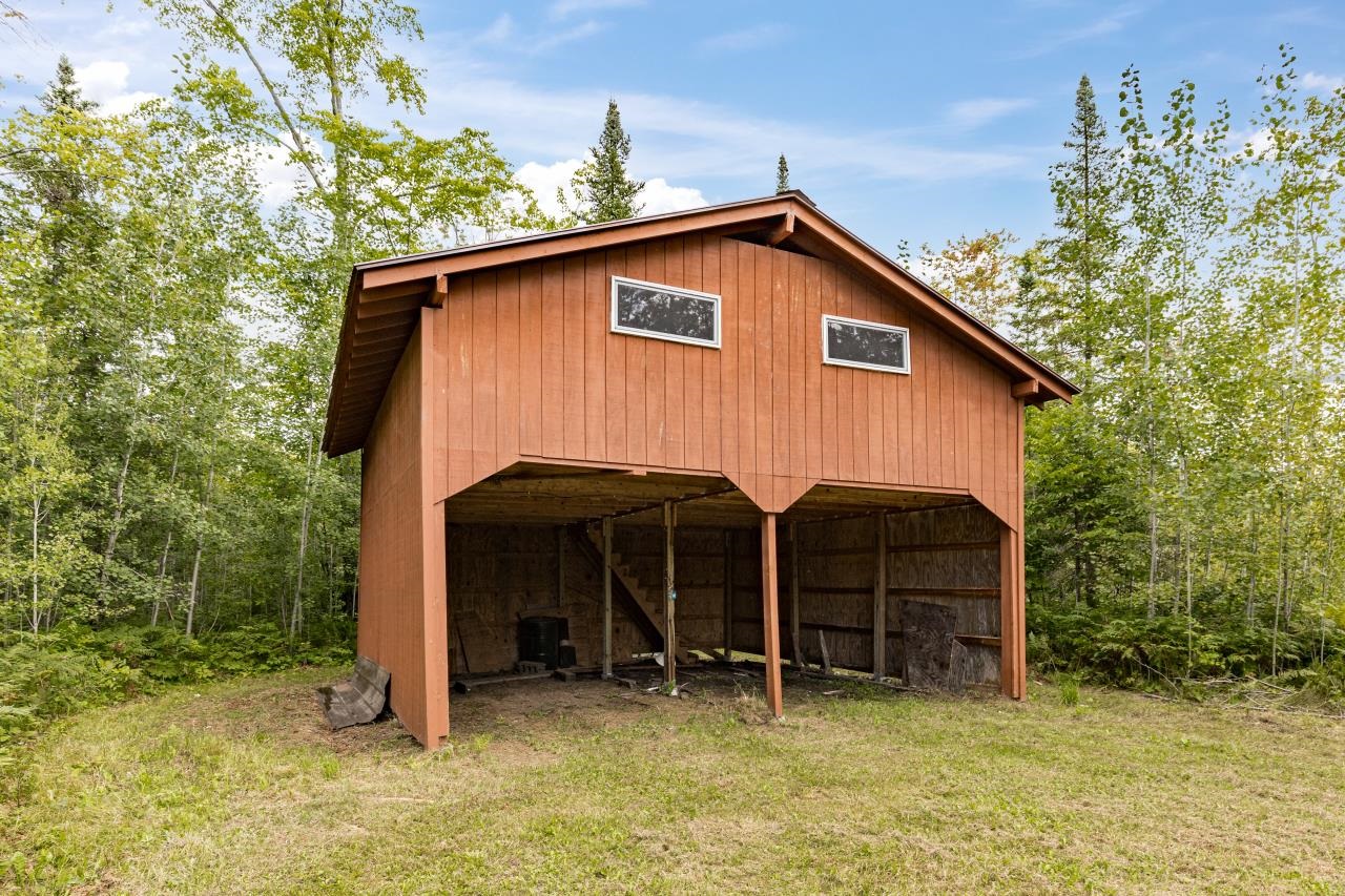 5854 Alborn-Brookston Road Alborn, MN 55702 - Photo 13 of 37 Outbuilding with overhead storage