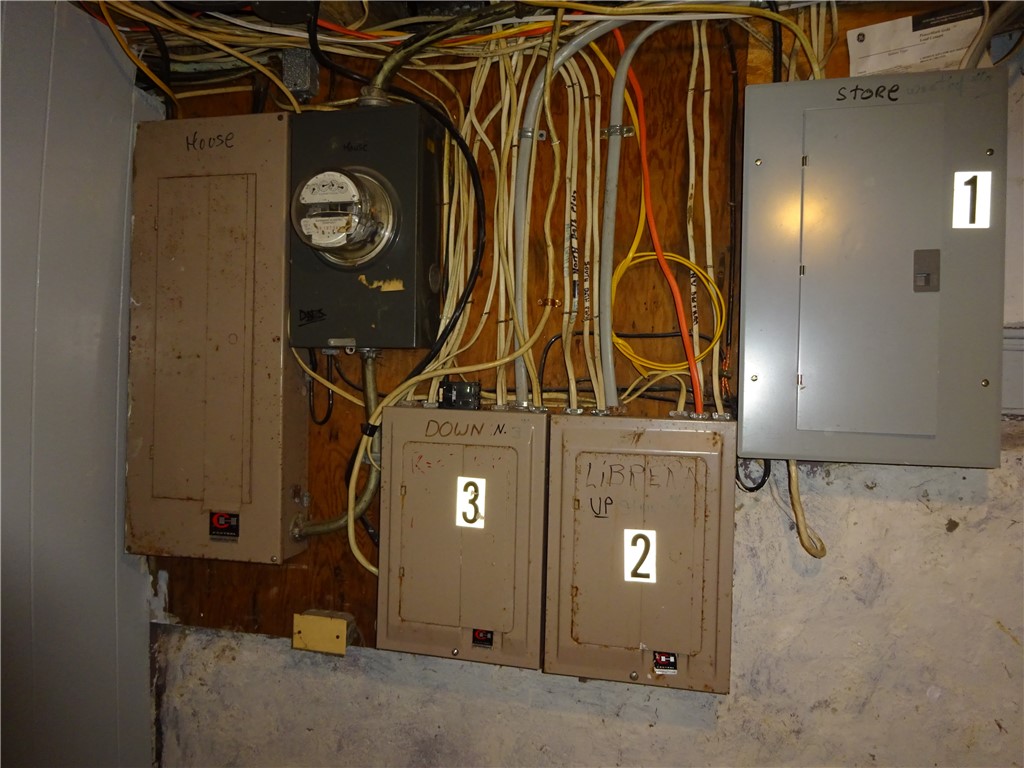 115 Murray Street Rochester, NY 14606 - Photo 28 of 35 4 separate electric panels for the 3 apartments an