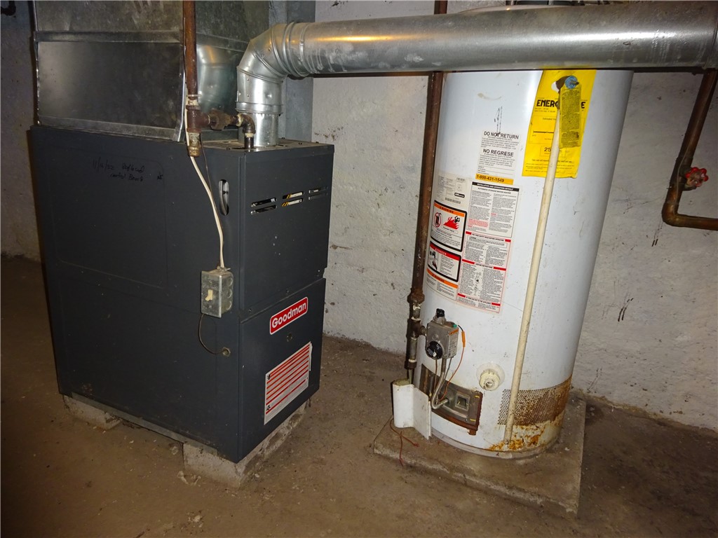 115 Murray Street Rochester, NY 14606 - Photo 30 of 35 Furnace and hot water heater for one of the apartm