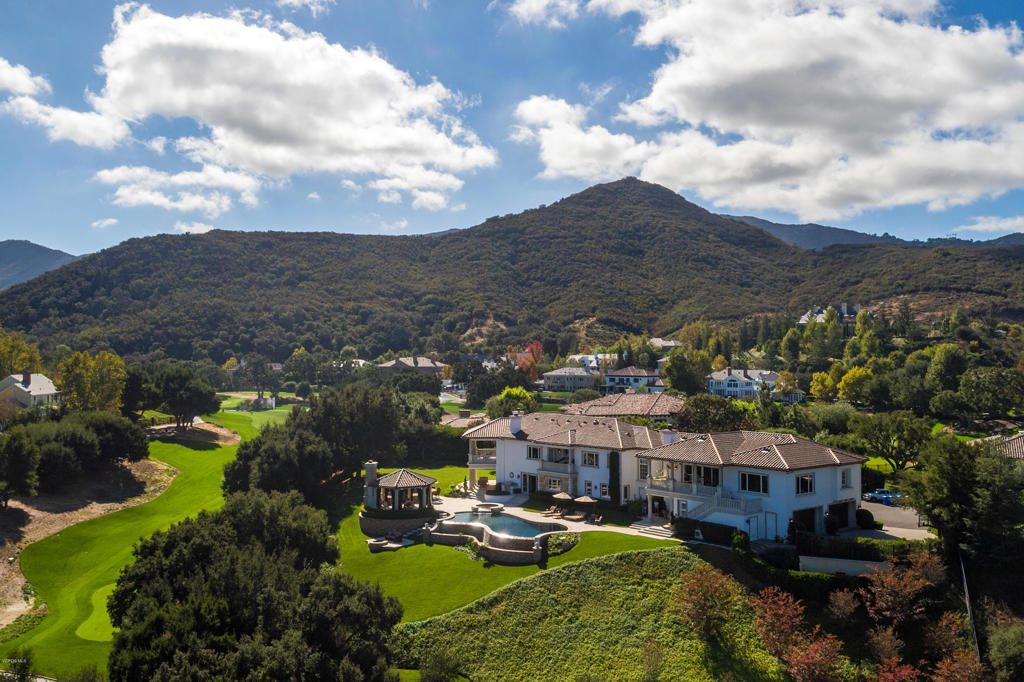 2705 Elderoak Road Thousand Oaks, CA 91361 - Photo 2 of 20 a aerial view of a house with swimming pool and mountains