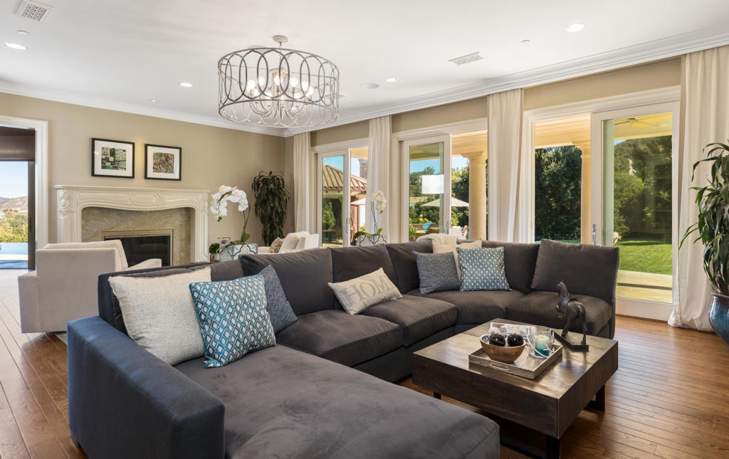 2705 Elderoak Road Thousand Oaks, CA 91361 - Photo 5 of 20 a living room with furniture fireplace and a large window